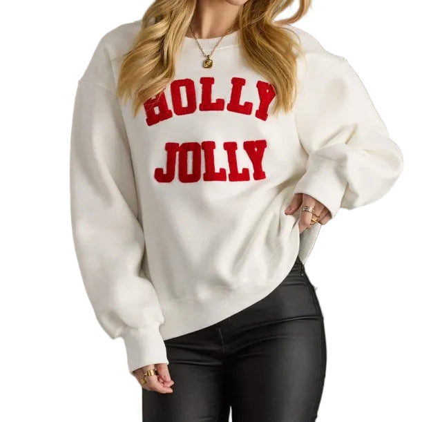 White Holly Jolly Sweatshirt styled with black pants and red boots
